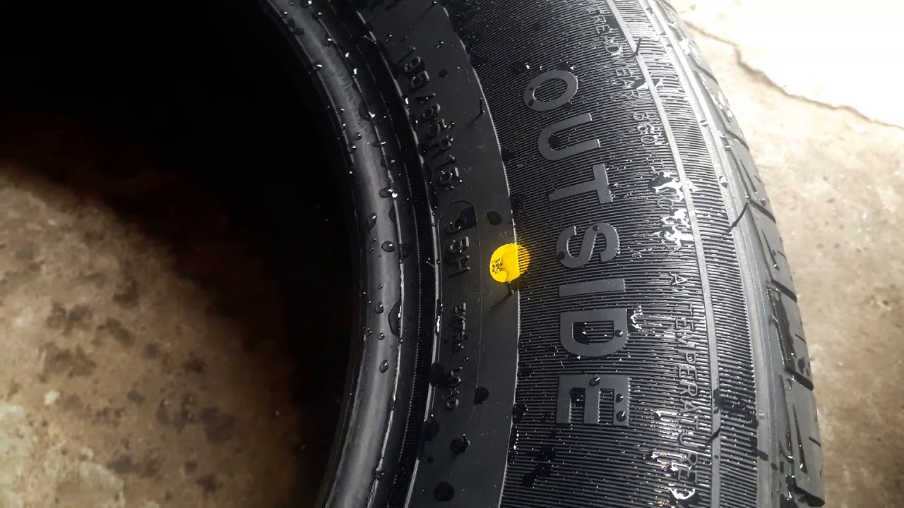 Красная метка на шине. Желтая точка на резине. Жёлтая точка на покрышке. Цветные точки на боковине шины. Метки на шинах для шиномонтажа.