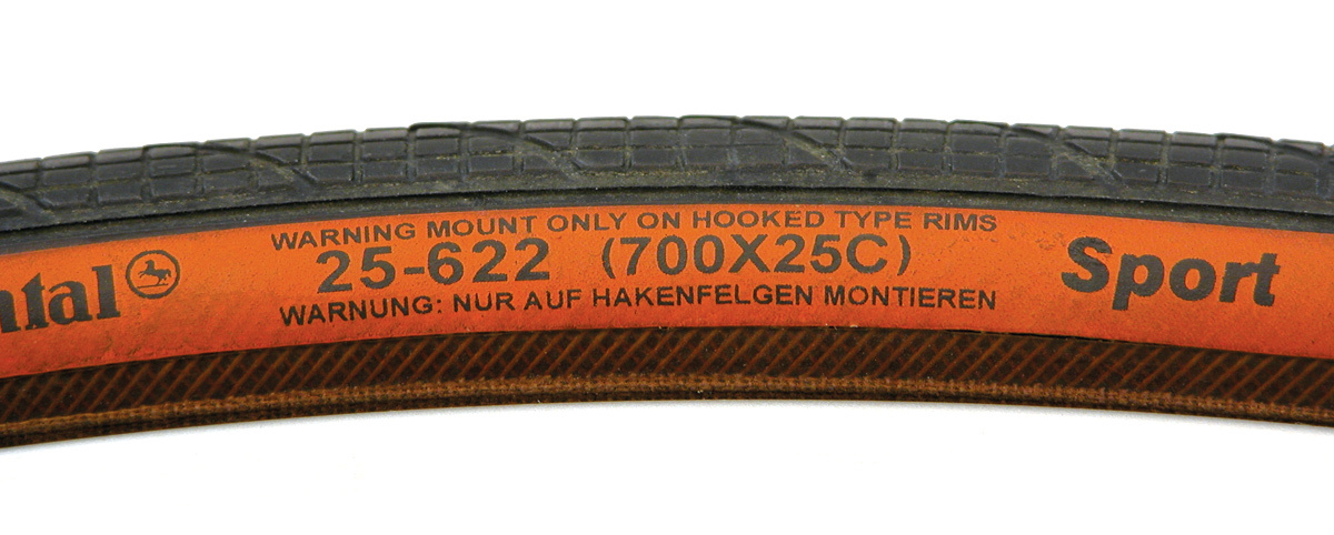 ISO (ETRTO) sizing numbers on tire label, along with French sizing